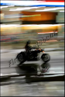 thru_town_in_the_rain_a6e01.jpg